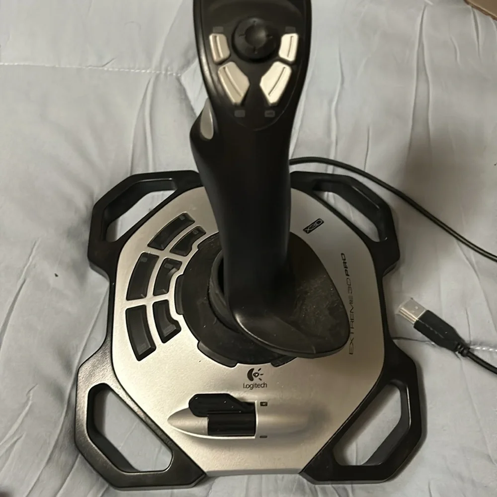 Logitech, extreme 3-D pro joystick/the club a mature game for windows. Vintge